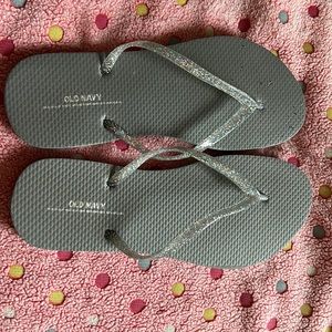 grey flip flops